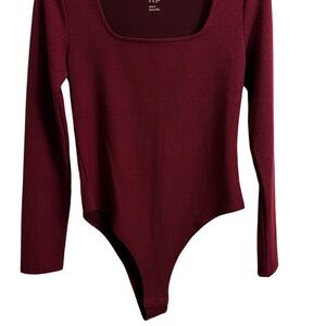 Long sleeve body suit size medium